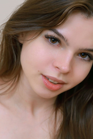 Indiana Petite Brunette Strips Sheer Top In A White Bedroom - Met-Art nude pic 13