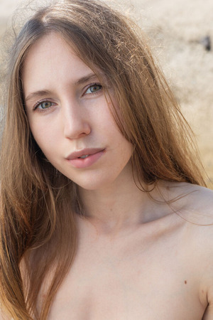 Naomi Love nude photo 11 - Naomi Love Bares Big Naturals On The Rocks