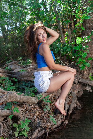 Sumiko Strips Outdoors On The Tree Roots By A Creek - Met-Art nude pic 01