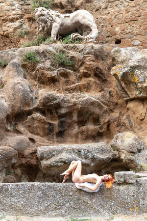 Mia Sollis nude photo 05 - Mia Sollis Sits Spread-Legged Against Lichen-Covered Rock
