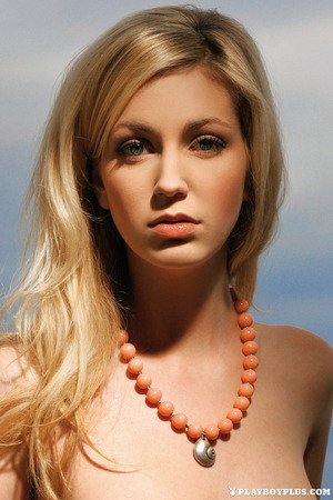 Mirna Sola Peels Blush Lace On A Balcony Over The Sea - Photo 04