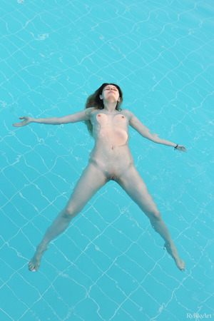 Katty Muss Pulls A Black Swimsuit Aside On A Rooftop - Photo 17