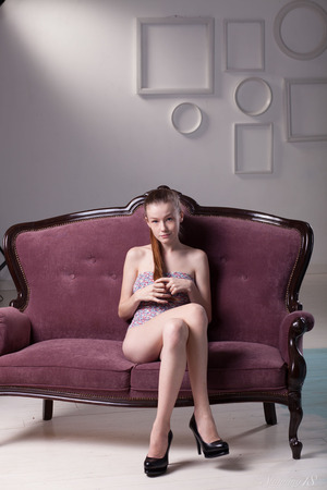 Emily Bloom Strips A Lilac Bodysuit On An Antique Sofa - Photo 00
