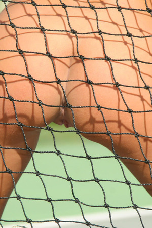Niobe L Hides Her Pussy Behind A Tennis Racket On The Court - Photo 12