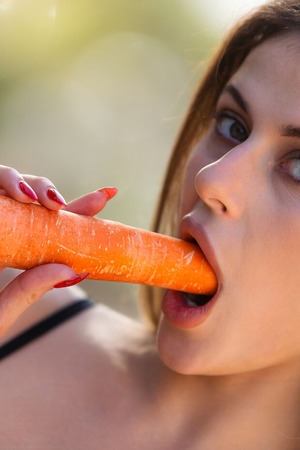 Bella nude photo 11 - Bella Sucks A Carrot And Rubs A Cucumber Between Her Legs