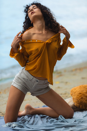 Aisha Vale Curly Brunette Strips On The Beach - Photo 05